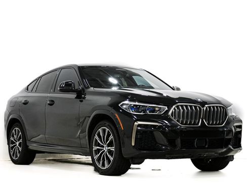 Used 2022 BMW X6 M50i w/ Executive Package AWD/4WD image 1