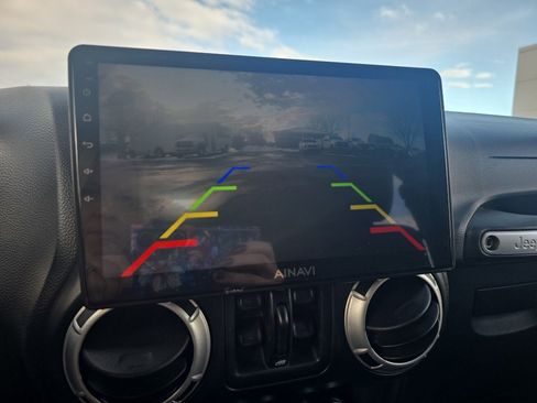 Used 2012 Jeep Wrangler Unlimited Sahara w/ Dual Top Group image 25