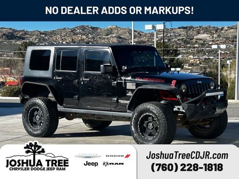 Used 2009 Jeep Wrangler Unlimited Rubicon w/ Dual Top Group image 1