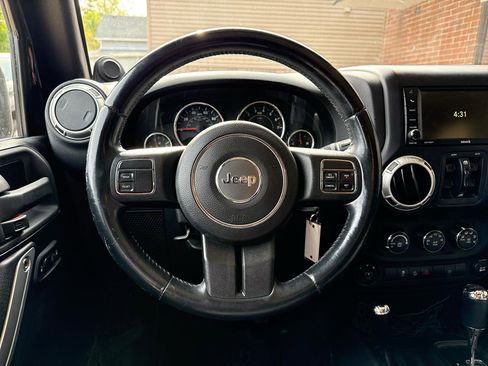 Used 2013 Jeep Wrangler Unlimited Sahara AWD/4WD image 13