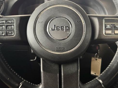 Used 2012 Jeep Wrangler Unlimited Sport AWD/4WD image 16