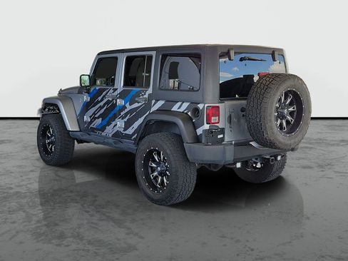 Used 2014 Jeep Wrangler Unlimited Sahara w/ Dual Top Group AWD/4WD image 3