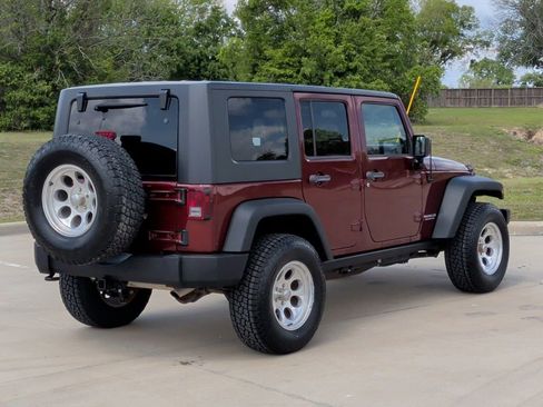Used 2010 Jeep Wrangler Unlimited Rubicon w/ Dual Top Group image 8