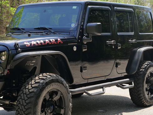 Used 2015 Jeep Wrangler Unlimited Sahara w/ Connectivity Group AWD/4WD image 54