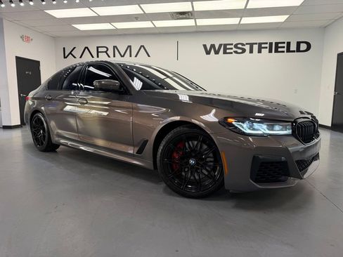 Used 2023 BMW M550i xDrive w/ Parking Assistance Package AWD/4WD image 1