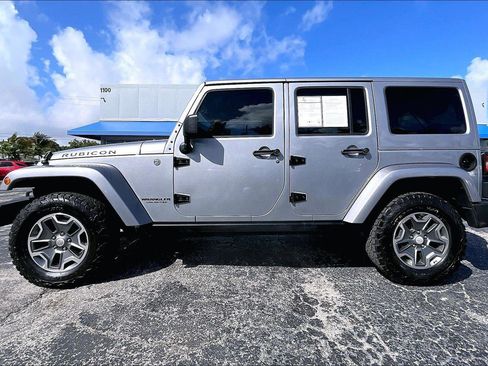 Used 2014 Jeep Wrangler Unlimited Rubicon w/ Dual Top Group AWD/4WD image 29