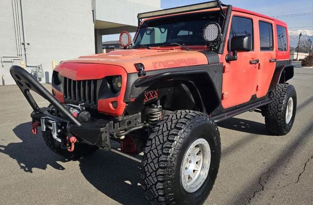Used 2013 Jeep Wrangler Unlimited Sahara AWD/4WD image 1