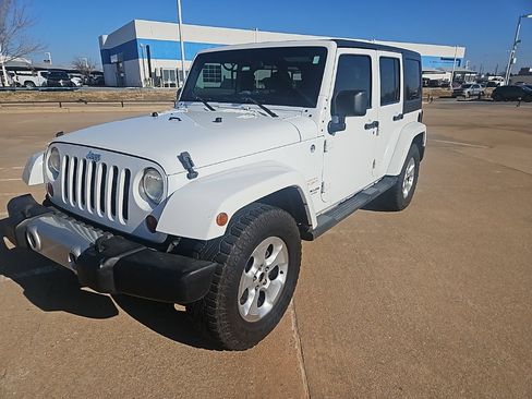 Used 2013 Jeep Wrangler Unlimited Sahara w/ Connectivity Group image 1