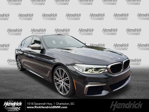 Used 2020 BMW M550i xDrive w/ Executive Package AWD/4WD image 1