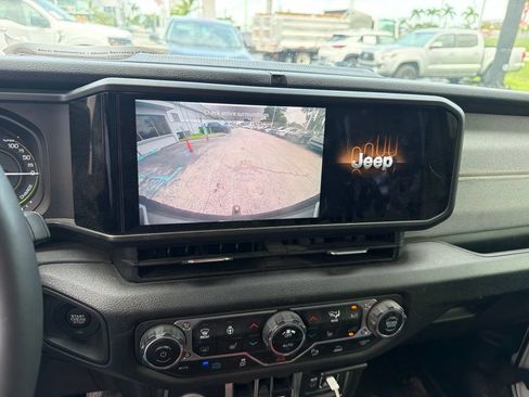 Used 2024 Jeep Wrangler Unlimited w/ Dual Top Group AWD/4WD image 6