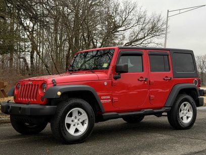Used 2011 Jeep Wrangler Unlimited Sport w/ Dual Top Group