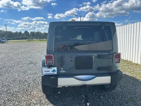 Used 2014 Jeep Wrangler Unlimited Sahara w/ Mopar Chrome Edition Group AWD/4WD image 4