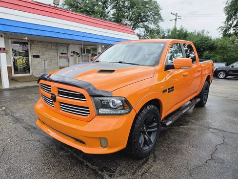Used 2017 RAM 1500 Sport w/ Ignition Orange Sport Package AWD/4WD image 1