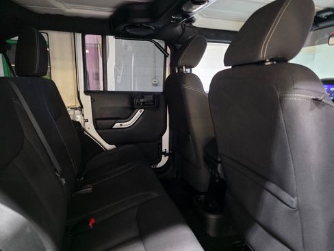 Used 2013 Jeep Wrangler Unlimited Sahara w/ Dual Top Group AWD/4WD image 22