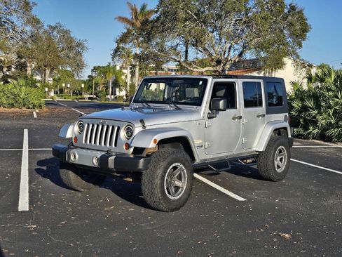 Used 2009 Jeep Wrangler Unlimited Sahara w/ Dual Top Group image 2