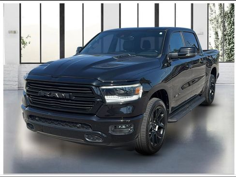 Used 2023 RAM 1500 Laramie AWD/4WD image 1