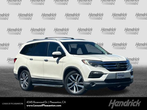 Used 2016 Honda Pilot Touring image 1