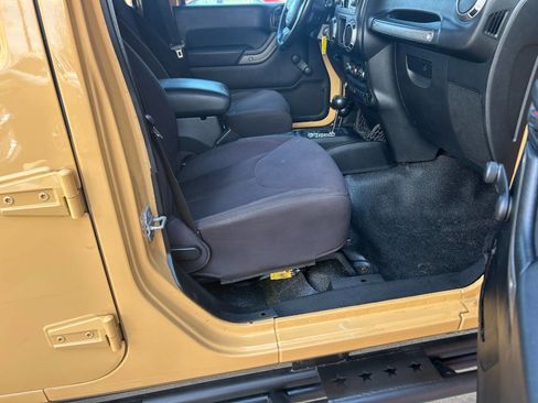 Used 2013 Jeep Wrangler Unlimited Sport w/ Mopar Black Appearance Group image 27