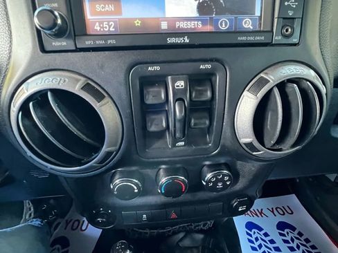 Used 2014 Jeep Wrangler Unlimited Sport w/ Dual Top Group AWD/4WD image 17