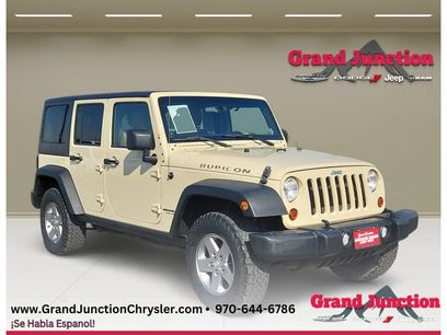 Used 2011 Jeep Wrangler Unlimited Rubicon w/ Dual Top Group