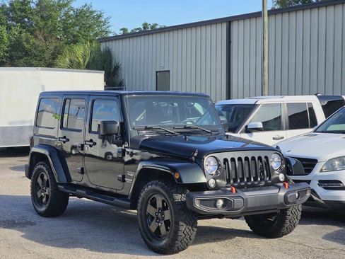 Used 2012 Jeep Wrangler Unlimited Sahara w/ Connectivity Group AWD/4WD image 1