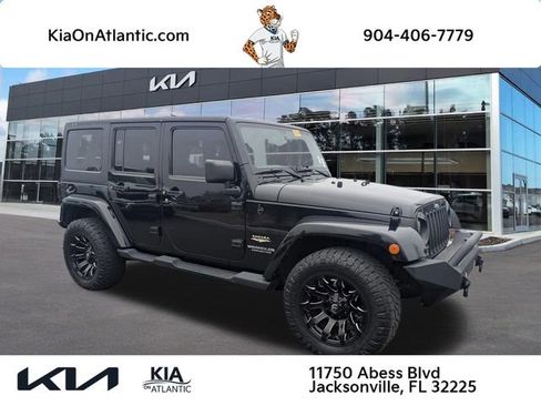 Used 2014 Jeep Wrangler Unlimited Sahara w/ Connectivity Group image 1