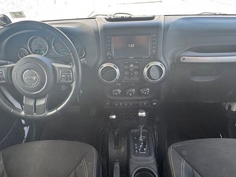 Used 2014 Jeep Wrangler Unlimited Sahara w/ Mopar Chrome Edition Group AWD/4WD image 12