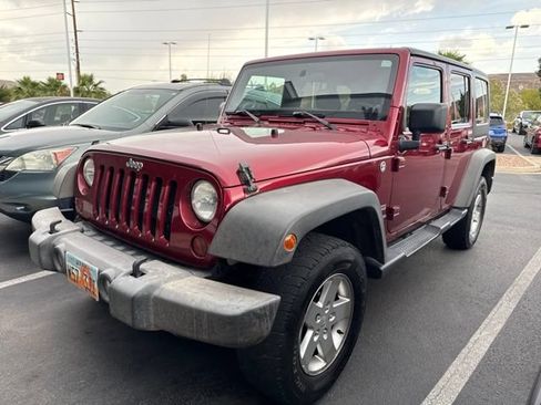 Used 2012 Jeep Wrangler Unlimited Sport AWD/4WD image 1