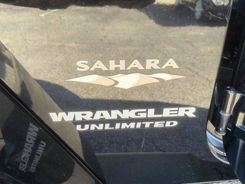 Used 2014 Jeep Wrangler Unlimited Sahara w/ Dual Top Group AWD/4WD image 29