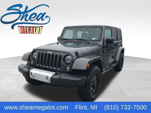 Used 2014 Jeep Wrangler Unlimited Sahara w/ Max Tow Package image 1