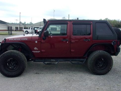 Used 2010 Jeep Wrangler Unlimited Rubicon w/ Dual Top Group image 4