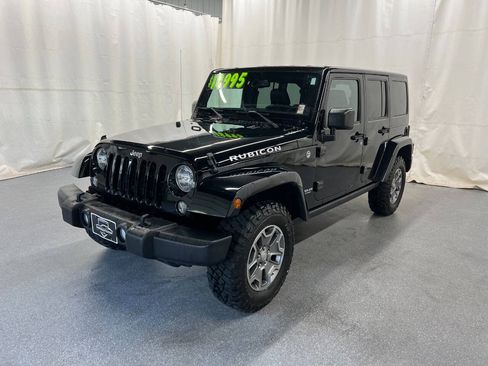 Used 2015 Jeep Wrangler Unlimited Rubicon w/ Dual Top Group AWD/4WD image 1