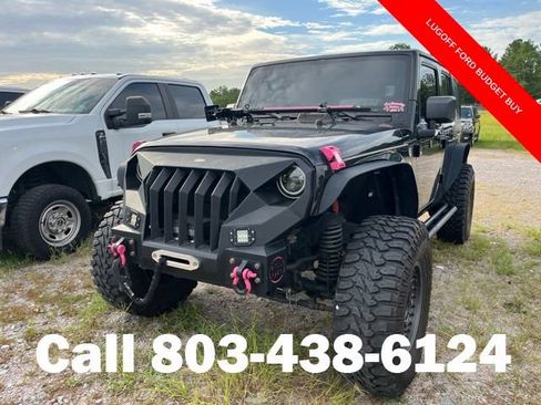 Used 2013 Jeep Wrangler Unlimited Sport AWD/4WD image 2