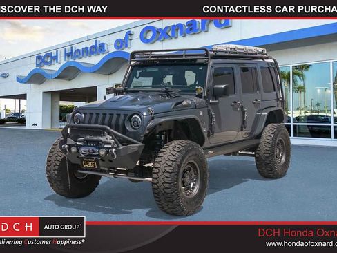 Used 2016 Jeep Wrangler Unlimited Sahara w/ Dual Top Group AWD/4WD image 1