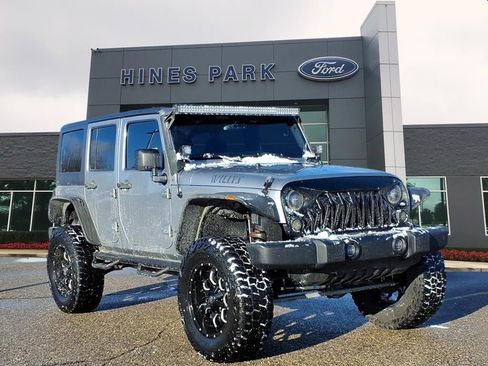 Used 2014 Jeep Wrangler Unlimited Sport image 1