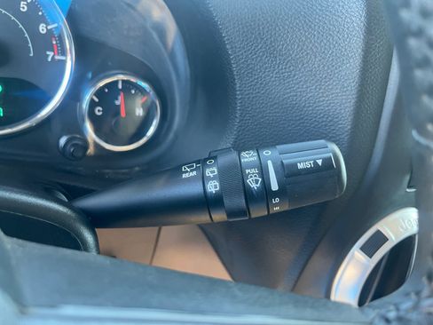 Used 2013 Jeep Wrangler Unlimited Rubicon w/ Dual Top Group AWD/4WD image 11
