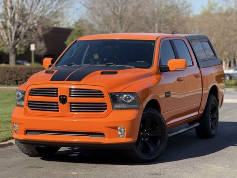 Used 2017 RAM 1500 Sport w/ Ignition Orange Sport Package AWD/4WD image 1