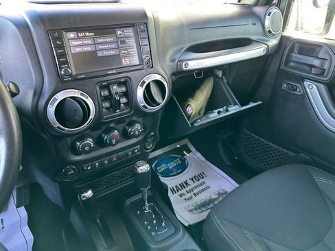 Used 2016 Jeep Wrangler Unlimited Sahara w/ Dual Top Group AWD/4WD image 29
