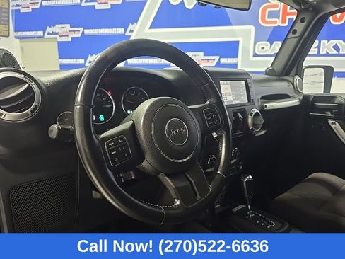 Used 2012 Jeep Wrangler Unlimited Sahara w/ Dual Top Group AWD/4WD image 16