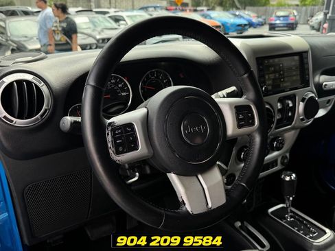 Used 2016 Jeep Wrangler Unlimited Sahara w/ Dual Top Group AWD/4WD image 16