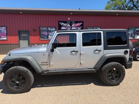 Used 2011 Jeep Wrangler Unlimited Sport AWD/4WD image 1