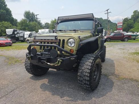 Used 2013 Jeep Wrangler Unlimited Sport w/ Trailer Tow Group AWD/4WD image 2