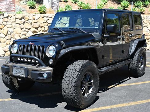 Used 2016 Jeep Wrangler Unlimited Sahara AWD/4WD image 1