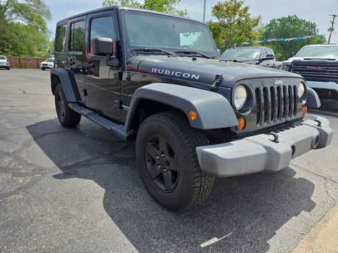Used 2012 Jeep Wrangler Unlimited Rubicon w/ Dual Top Group AWD/4WD image 4
