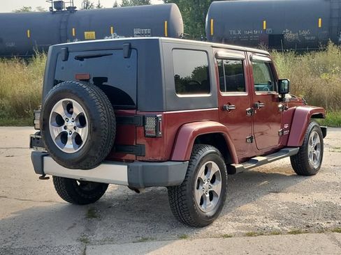 Used 2009 Jeep Wrangler Unlimited Sahara w/ Dual Top Group AWD/4WD image 4