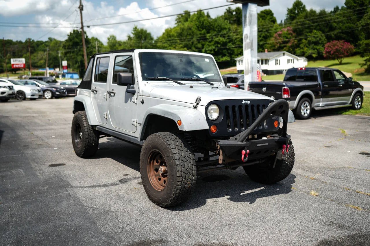Used 2012 Jeep Wrangler Unlimited Rubicon w/ Dual Top Group AWD/4WD image 13