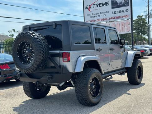 Used 2014 Jeep Wrangler Unlimited Sahara w/ Max Tow Package AWD/4WD image 9