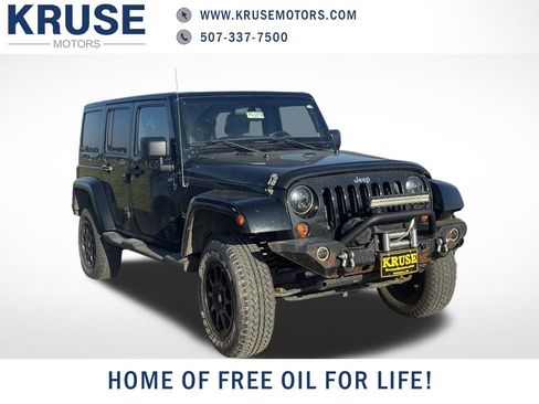 Used 2012 Jeep Wrangler Unlimited Sahara w/ Dual Top Group AWD/4WD image 1