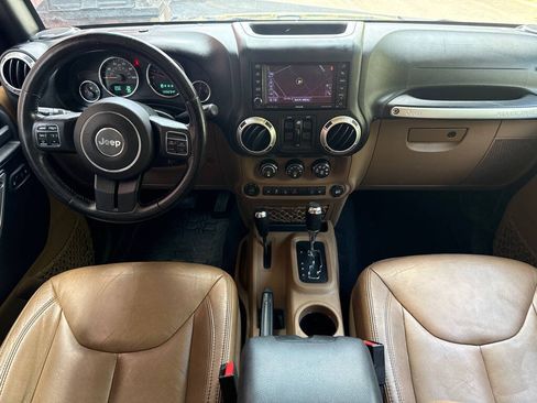 Used 2015 Jeep Wrangler Unlimited Rubicon w/ Dual Top Group AWD/4WD image 14