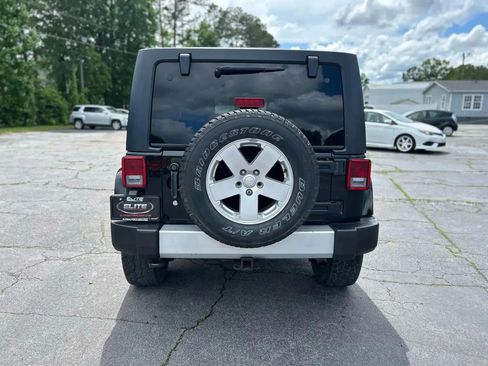 Used 2012 Jeep Wrangler Unlimited Sahara w/ Dual Top Group image 7